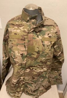 Army Combat Uniform OCP Shirt Jacket. Various Sizes. Due to having various sizes actual product may be slightly different than picture . All products in excellent condition. Combat Style Khaki Long Sleeve Windbreaker, Camouflage Long Sleeve Cotton Outerwear, Air Force Dress Blues, Camouflage Cotton Long Sleeve Outerwear, Air Force Dress, Long Sleeve Camouflage Windbreaker With Pockets, Khaki Military Utility Jacket With Multiple Pockets, Solid Color Military Utility Jacket For Outdoor, Army Combat Uniform