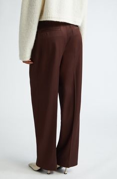 A single pleat cuts a crisp crease down the front of these mid-rise trousers tailored with a relaxed fit. 31" inseam; 20 1/2" leg opening; 13" front rise; 16 1/2" back rise (size 8) Zip fly with hook-and-bar closure Front slant pockets 65% rayon, 35% cotton Dry clean Made in the USA Designer Clothing Classic Wide Leg Bottoms With Concealed Placket, Classic Brown Dress Pants With Straight Hem, Classic Full Length Wide Leg Pants With Relaxed Fit, Tailored Straight Hem Brown Bottoms, Modern Relaxed Fit Bottoms For Formal Occasions, Formal Relaxed Fit Wide Leg Pants, Brown Tailored Bottoms With Straight Hem, Classic Relaxed Fit Pants With Pressed Crease, Classic Pants With Loosely Fitted Hips And Straight Hem