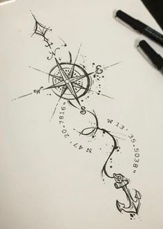 an anchor and compass tattoo design on paper