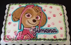 a birthday cake with a dog on it