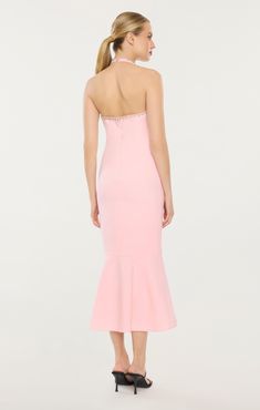 Get ready to turn heads in the Molinaro Dress! With its embellished details and halter neckline, this midi dress is the perfect combination of elegance and playfulness. Made with our Favorite Stretch material, it offers both comfort and style. The flattering trumpet silhouette and pretty pink hue make it a must-have for any occasion. Fit Details Halter necklineLinedTrumpet silhouetteMidi lengthSleeveless67% Polyester 27% Rayon 6% SpandexDry Clean Only ImportedLength: 48in/121.92cm, from neck edgeMeasurements from size 4 Rose Shadow, Trumpet Silhouette, Fit Details, Maxi Dress Evening, Sweet Gifts, Halter Neckline, New Arrival Dress, Pretty Pink, Price Match