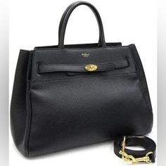 Introducing A Stunning Mulberry Belted Bayswater Pebbled Satchel In Black Leather. This Medium-Sized Shoulder Bag Is Perfect For Any Occasion, Be It Travel, Casual Outings, Workwear, Or Business Meetings. The Bag Features A Turn Lock Closure, Double Handles, And A Detachable Strap For Added Convenience. Crafted From High-Quality Leather And Pebbled With A Unique Pattern, This Bag Is Both Stylish And Durable. The Interior Is Lined With Soft Cotton And Features Bottom Studs To Keep Your Belongings Mulberry Abbey Bucket Bag, Mulberry Darley Bag, Mulberry Bayswater Black, Black Satchel With Turn-lock Closure And Double Handle, Black Leather-handled Satchel Box Bag, Mulberry Bayswater, Mulberry Bag, High Quality Leather, Unique Patterns