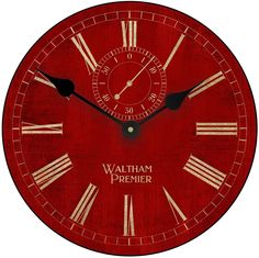 a red clock with roman numerals and the words walt primer on it