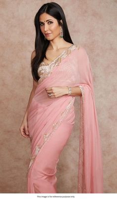 Bollywood Replica SareeBollywood Katrina Kaif inspired Peach plain georgette saree with sparkle border work and sparkle blouse set fully stitched upto size 42Shipping time 5-7 days .Buy this Saree at Kollybollyethnics and make your occasion very special !!. With Express Free Shipping and Custom Stitching, Shop Bollywood Katrina Kaif inspired Peach georgette saree online at kollybollyethnics from India with free worldwide shipping. Plain Georgette Saree, Manish Malhotra Saree, Peach Color Saree, Sparkle Blouse, Indian Fashion Saree, Manish Malhotra, Embellished Blouse, Stylish Sarees, Silk Sari