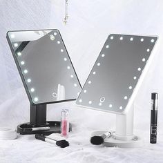 an image of a makeup mirror with lights on it and the price is $ 69 99