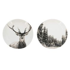 two plates with deer and trees on them