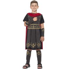 a young boy dressed as a roman gladiator standing in front of a white background