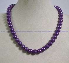 jewelry: purple beaded necklace  bead material: plastics pearl  clasp: stainless steel lobster clasp and a 2 inches adjustable chain Diameter: 10mm Shape : round Luster: High body: clean Necklace length: choose colour: purple Packing:Beautiful Pouch If you want to order of different style. Please feel free contact me . Thank you . back to my store: https://www.etsy.com/shop/goodglasspearl?ref=l2-shopheader-name Purple Round Beads Pearl Necklace For Gift, Purple Single Strand Pearl Necklace, Purple Pearl Single Strand Necklace, Elegant Purple Beaded Necklace With Round Beads, Purple Pearl Necklaces With Round Beads, Purple Pearl Single Strand Jewelry, Purple Beaded Pearl Necklace, Purple Single Strand Pearl Jewelry, Purple Pearl Necklace