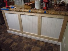 a kitchen counter with many items on it