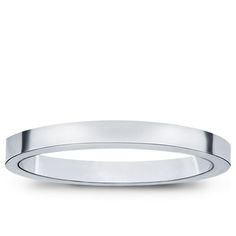 a white gold wedding ring on a white background