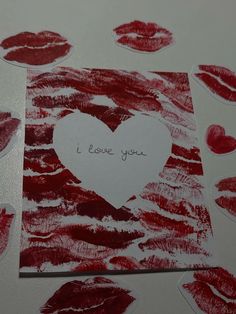 valentine's day card with red lips and i love you written on it