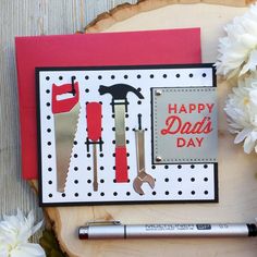 a father's day card with tools and flowers