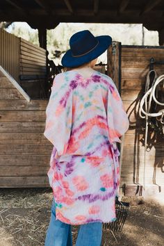 Are you looking for something special to rock at your next music festival? Look no further than the Daydream Tie Dye Cover Up! This kimono is full of stylish fun, sure to make you stand out in a crowd. You'll be the talk of the town with this pretty piece as your go-to festival must-have! #lovemyleto 100% Polyester Imported White Hippie Cover-up For Spring, Hippie White Cover-up For Spring, White Hippie Style Cover-up For Spring, White Spring Festival Kimono, Beach Season Festival Cover-up With Kimono Sleeves, Multicolor Cotton Summer Cover-up, One Size Festival Cover-up, Beach Festival Cover-up With Kimono Sleeves, Multicolor Cotton Cover-up For Summer