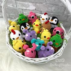 a basket filled with lots of small stuffed animals