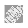 the home depot logo is shown in white on a gray background with black and white lettering