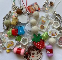 a bunch of charms that are on a table