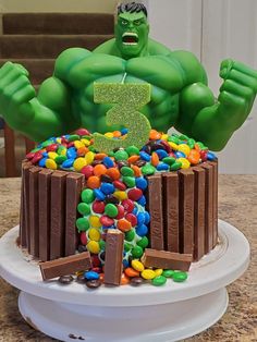 the hulk cake is decorated with candy and candies