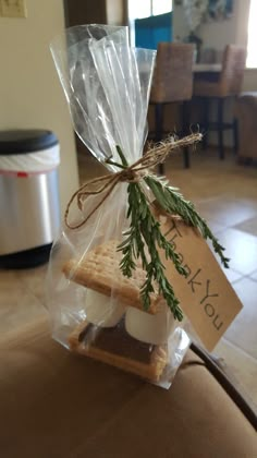 some cookies are wrapped in cellophane and tied with twine