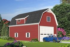 a large red barn with a car parked in front