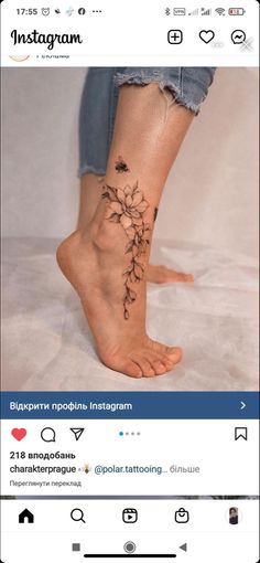 a woman's foot with flowers on it and the words instagramn written in russian