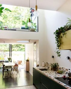 the kitchen is clean and ready to be used as a dining room or living area