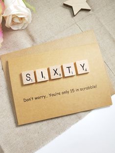 a card with scrabbles that says, sixty don't worry you're only 15 in scrabble