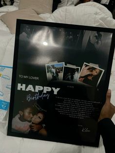 a person holding up a birthday card with photos on it and the caption to my lover, happy birthday