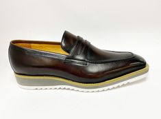 Style: 515-42-Chestnut Handsome Full Calfskin slip-on Penny Loafer from our Carrucci by Maurice collection features full Leather Lining, a clean welt and Tricolored Lightweight Rubber Sole! Brown Moc Toe Loafers With Contrast Sole, Brown Slip-on Loafers With Contrast Sole, Brown Slip-on Moccasins With Contrast Sole, Brown Moccasins With Contrast Sole For Formal Occasions, Formal Brown Moccasins With Contrast Sole, Elegant Brown Moccasins With Contrast Sole, Brown Slip-ons With Contrast Sole For Work, Brown Slip-on Oxfords With Contrast Sole, Classic Brown Moccasins With Contrast Sole