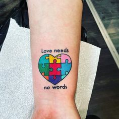 a person's arm with a tattoo that says love needs no words