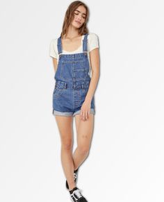 A shortened version of our favorite Ziggy Overalls! Featured in a classic bib-and-brace silhouette with relaxed fit and rolled hemlines for a timeless touch. Front bib pocket Adjustable straps Side button closures Five pocket design Frayed cuffs We The Free Heritage inspired and lived-in staples. We The Free is an in-house label. Care/Import Machine Wash Cold Import Measurements for size small Waist: 34 in Inseam: 5.5 in Hips: 43 in Rise: 11.75 in Medium Wash Shortalls With Adjustable Straps, Blue Denim Shortalls With Adjustable Straps, Blue Casual Shortalls With Adjustable Straps, Casual Blue Shortalls With Adjustable Straps, Medium Wash Cotton Shortalls With Adjustable Straps, Casual Blue Denim Jumpsuit With Adjustable Straps, Casual Medium Wash Shortalls With Adjustable Straps, Ziggy Overalls, School Shorts