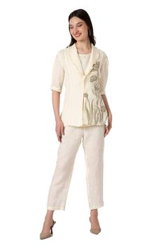 Off-white blazer with dainty bloom print and zari embroidery on hem. Paired with inner and pant. - Aza Fashions Elegant Linen Sets With Straight Pants, Cream Sets For Workwear In Spring, Tailored Cotton Sets For Spring, Elegant Embroidered Linen Sets, Elegant Linen Sets With Floral Embroidery, Fitted Workwear Sets With Floral Embroidery, Fitted Floral Embroidery Sets For Workwear, Festive Fitted Linen Sets, Fitted Floral Embroidery Sets For Work