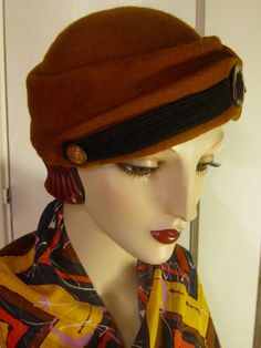 ON SALE/ Original price: $225.00 As fashionably relevant as they were in the early 1930's, percher hats are back in our new Fall/Winter Collection 2016 for Orsini-Medici Couture Millinery!! This chic little chapeaux is one you'll want to grab any day of the week!! Dress it up or down, and go just about anywhere in it!! Entirely hand blocked on a vintage wooden hat block, hand sewn, fully lined, and detailed with an authentic 1930's celluloid dress buckle and matching button.   All the hats in th Retro Cloche Felt Hat For Winter, Retro Winter Cloche Felt Hat, Retro Winter Cloche Hat With Short Brim, Winter Retro Cloche Hat With Short Brim, Adjustable Vintage Felt Hat For Fall, Retro Wide Brim Cloche Hat For Winter, Vintage Cloche Hat For Winter, Vintage Wool Cloche Hat For Winter, Vintage Adjustable Hat Bands For Fall