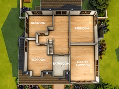 an aerial view of a house with the floor plan