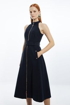 Go Seamlessly From Day To Night In Our Midi Dress, With A Metallic Zip In The Centre, As Well As A Belted Waist For A Cinched Silhouette, And A Long, Full Skirt. Style It With Block Heels Or Ankle Boots For A Look Perfect For Office Days, Then Wear It With Heeled Boots Or Strappy Heels For An Evening Look. Tailored Cotton Belted Halter Neck Full Skirted Midaxi Dress High Quality Cotton Fabric Flattering Fit And Flare Silhouette V Neckline Formal High Neckline Belted Waist Feature Thigh High Leg Hen Do Outfits, Bride Jumpsuit, Petite Wedding Guest Dresses, Workwear Capsule Wardrobe, Spring Wedding Guest Dress, Ibiza Outfits, Fall Wedding Guest Dress, Tall Dresses, Full Skirt Dress