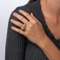 Finely detailed vintage Cartier bombe cocktail ring (circa 1945) crafted in 14 karat yellow gold.    The stylish vintage ring features a fluted high dome in a textured shell motif. The whimsical design of the ring highlights the bold aesthetic of the retro period. The dome rises 9mm from the finger (0.35 inches) and sits comfortably on the hand. We were lucky to acquire the set of jewelry including the ring, brooch and earrings (each sold separately).    The ring is accompanied by a letter of expertise from the International Antique Jewelers Association Expertise (IAJA Expertise) confirming the authenticity of the Cartier ring.  The ring is in good condition showing minimal wear. We have not cleaned it in order to preserve the patina and collector value.    Particulars:    Weight: 8.6 gram Antique Cartier Yellow Gold Jewelry, Cartier Vintage, Orange Cocktails, Green Cocktail, Vintage Cocktail Ring, Gold Cocktail Ring, Gold Cocktail, Shell Jewelry, Domed Ring