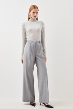 Crafted From Sumptuous Wool, These Wide-Leg Tailored Pants Elegantly Drape The Silhouette. The Front Pleats And Back Darts Create A Flattering Silhouette, While The Side Pockets Add Functionality. Finished With Belts Loops And A One Button Design, This Piece Is A Capsule Closet Staple.Tailoredpantszip Fasteningwide Leg Tailored Trousers Women, Tailored Gray Wide Leg Pants, Tailored Wool Wide-leg Pants, Tailored Trousers With Belt Loops, Wool Wide-leg Dress Pants With Belt Loops, Tailored Gray Trousers, Wide Pants Outfit, Grey Trousers, Classic Wardrobe Staples