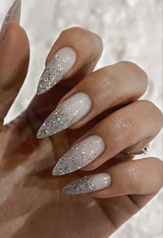 Nails White Silver Glitter, Sparkle Nails Ideas, Almond Long Acrylic Nails, Silver Nails Long, Nye Nail Ideas New Years Eve, White Silver Glitter Nails, New Years Nails Acrylic Almond, Glitter Nails Silver, White Winter Nails Almond