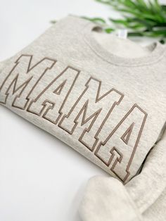 EMBROIDERED Mama Sweatshirt, Birthday gift mama Crewneck, Personalized Sweatshirt, Trendy Crewnecks for Women, Mom gifts, Mother days   The product in the first picture is made with suede brown thread on an oatmeal heather sweatshirt. 💕WELCOME TO Love Stitches Co If you are looking for soft, comfy, first-rate sweatshirts, you're in the right place! Here at Love Stitches Co, we love what we do and strive to make your shopping experience just right for you. If you have any questions, concerns, or Mother's Day Gift Tops With Letter Embroidery, Mother's Day Gift Tops With Embroidered Text, Mother's Day Embroidered Text Tops, Crewnecks For Women, Mama Embroidered Sweatshirt, Mom Christmas Shirt, Mother Days, Mother Days Gift, Mama Crewneck