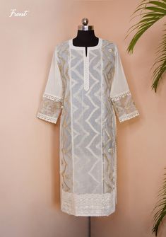 Our exclusive double layer kurti is designed for someone who likes to keep it bold and classy. This is a simple yet elegant piece of perfection. Layering it up with Chikankari design and Zig-Zag gota work embellishments. Ready to wear style ethnic clothing. Apt for occasions of all kind. Best paired with our wide range of designer palazzo and dupatta to complete the look. Shop them at : www.etsy.com/shop/PeachTreeIN  Kurti description: - Components: 1 (Kurti) - Decoration: Zig-Zag gota work (inner and outer), All over Chikankari (outer) - Color: Off white (Ivory) - Neckline: Notch - Sleeve: Bracelet sleeve - Hem length: Knee  Fabric Details: - This fabric is dye-able. - Perfect choice for summers since the fabric is 100% Voile and net breathable fabric. - Best quality fabric.  Wash Care in Chikankari Design, Net Kurti, Designer Palazzo, Design Kurti, Ethnic Kurti, Chikankari Kurti, Dress Designing, Designing Ideas, Gota Work