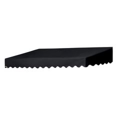 a black counter top with a large knife on it's side and a white wall in the background