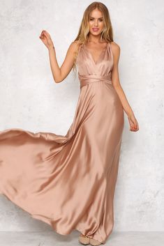 The Mind And Memory Maxi Dress has a smooth, silky fabric that glides over the body. A plunging v-neckline is secured with long halter-neck ties that fall gracefully over an exposed back. A hidden back zipper with a hook and eye closure holds the dress in at the waist. We love this dress with delicate gold jewellery! 
 Maxi dress. 
 Not lined. 
 Cold hand wash only. 
 Model is standard XS and is wearing XS. 
 True to size. 
 Slightly stretchy fabric. 
 Polyester. Jasmine Bridesmaids Dresses, Bridesmaid Dresses 2018, Jasmine Bridal, Satin Fashion, Special Event Dresses, Surplice Dress, Long Bridesmaid Dress, Maxi Dress Online, Vestidos Prom