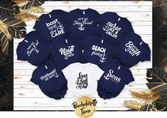 a group of sweatshirts with the names of each team in white and navy blue