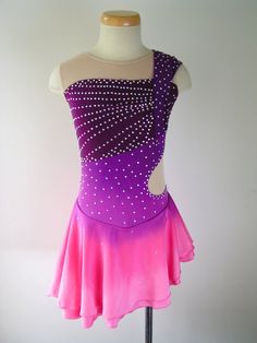 a pink and purple dress on a mannequin