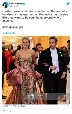 a man in a tuxedo walking next to a woman in a gown on the red carpet