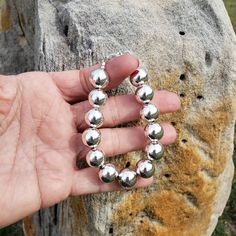 "Beautiful! 🛑 BEFORE CHOOSING YOUR LENGTH/SIZE PLEASE READ ENTIRE DESCRIPTION 🛑                               These VERY LARGE beads affect INSIDE circumference (what your wrist measures with a string/ribbon/measuring tape) which affects OUTSIDE circumference.  Large, shiny 12mm round ball sterling silver bead bracelet.                                                          🚩 🚩 🚩  IMPORTANT  IMPORTANT  THE BIGGER THE BEADS, THE MORE LENGTH REQUIRED for a good fit. EXAMPLE:  If you \"typic Large Beads, Sterling Silver Bead Bracelet, Wrist Wrap, Silver Bead Bracelet, Beading Wire, Bracelet Sterling Silver, Silver Bead, Measuring Tape, Sterling Silver Bead