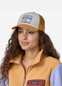 Elevate your headwear collection with the Patagonia Line Logo Ridge LoPro Trucker Hat. Designed for both style and functionality, this cap features a sleek and low-profile silhouette with a curved brim that offers sun protection. The organic cotton front panel showcases the iconic Patagonia Line Logo, reflecting your commitment to outdoor adventures and sustainable living. Its breathable mesh back keeps you cool in any outdoor pursuit, making it a go-to choice for everything from hiking trails t Outdoor Trucker Hat With Curved Bill, Spring Trucker Hat With Curved Brim For Outdoor Activities, Lightweight Visor Trucker Hat, Casual Hiking Hats With Uv Protection, Casual Trucker Hat For Hiking, Lightweight Casual Baseball Cap, Lightweight Casual Hiking Hats, Patagonia Curved Brim Hats For Outdoor Activities, Patagonia Adjustable Curved Brim Hat