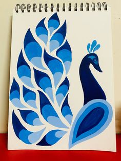 a drawing of a blue and white peacock