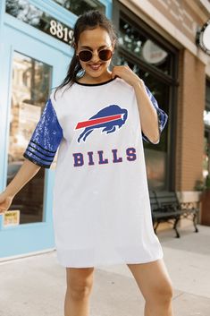 Elevate your game day look with our Buffalo Bills full sequin jersey tunic dress. Designed with sports striping details on the sleeves and a lightweight garment lining, it ensures both style and comfort. Whether you're cheering from the stands or watching from home, rock your favorite school or team in standout fashion Sequin Jersey Dress, Sequin Jersey, Gameday Couture, Dresses Xxl, Jacksonville Jaguars, Team Apparel, Buffalo Bills, Detroit Lions, New York Jets