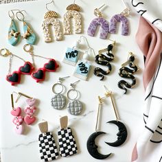 Super cute and trendy eras tour earrings for your favorote swiftie! Each era included in order: Debut, Fearless, Speak Now, Red, 1989, Reputation, Lover, Folklore, Evermore, Midnights Taylor Swift Eras Earrings, Taylor Swift Reputation Earrings, Taylor Swift Eras Tour Earrings, Speak Now Earrings, Taylor Swift Inspired Earrings, Taylor Swift Polymer Clay, Taylor Swift Polymer Clay Earrings, Polymer Clay Drop Earrings For Party, Taylor Swift Clay Earrings