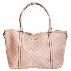 This Gucci tote bag is made out of coded canvas with the Gucci web GG monogram. Featuring leather finishes, dual tall handles, an open top with brown woven interior lining. COLOR: Pink MATERIAL: Coated canvas with leather finishes ITEM CODE: 197953 213048 MEASURES: H 10” x L 16” x D 5.5” DROP: 8” CONDITION: Good - the bottom of the bag shows scuffs, scrapes and stains. The interior shows signs of use with marks and stains. Made in Italy ------------------------------------------------------------------------------------------------------------- CARTEBLANCHESHOP.COM is an online boutique which also provides curation, consignment and customization services for authentic designer luxury items. CARTEBLANCHESHOP.COM is not an authorized brand dealer of Hermes, Chanel, Gucci, Saint Laurent or Di Beige Gucci Bags In Coated Canvas, Gucci Beige Signature Coated Canvas Bag, Gucci Shoulder Bag In Signature Coated Canvas For Everyday, Gucci Tote Bag For Everyday Use, Gucci Shopping Bags With Handles, Gucci Double Handle Shopping Bag, Gucci Shopping Bag With Double Handle, Gucci Monogram Canvas Bag For Shopping, Gucci Monogram Canvas Shopping Bag